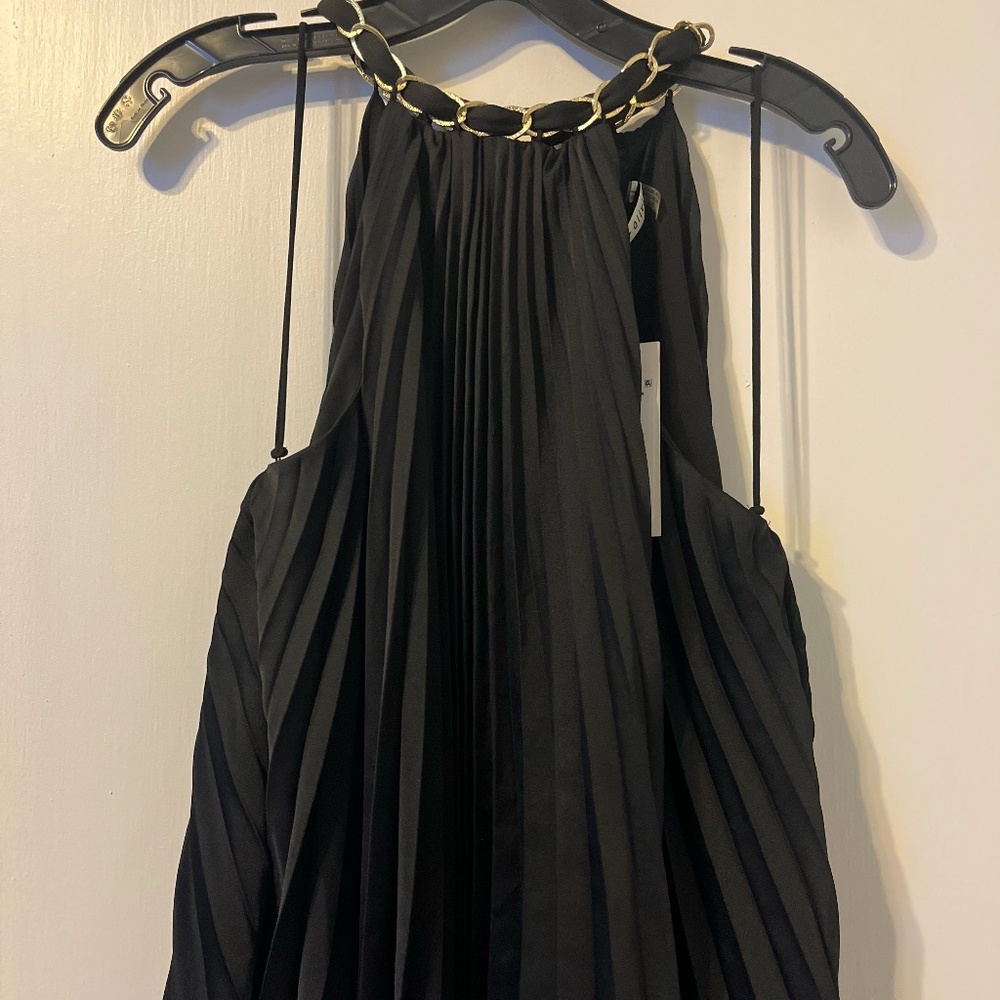 Alice + Olivia black blouse with gold chain detail. NEW WITH TAGS